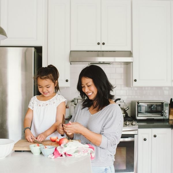 Mother and child in kitchen image